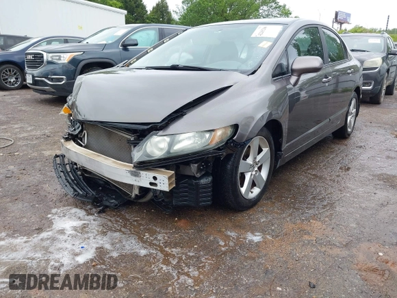 2010 Honda Civic LX-S z VIN 19XFA1F60AE070633, wystawiony jako IAAI lot #42205266 z przebiegiem 217 467 mil mil oraz . Historia ofert i sprzedaży dostępna na DreamBid. Obrazek 2.