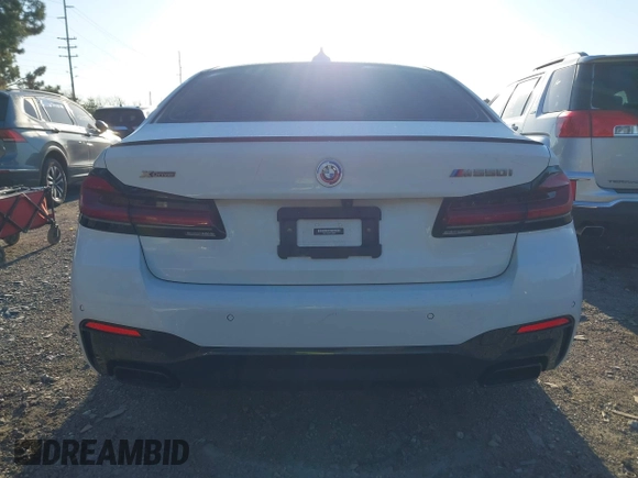 2023 BMW 5 Series M550i xDrive with VIN WBA13BK04PCL88909, listed as a IAAI auction lot 42045994 with 27,729 mi miles and . Bid and sale history available at DreamBid. Image 17.