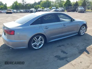 2017 Audi A6 Premium with VIN WAUF8AFC6HN078756, listed as a IAAI auction lot 42412413 with 149,930 mi miles and . Bid and sale history available at DreamBid. Image 4.