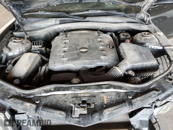 2014 Chevrolet Camaro LT z VIN 2G1FC1E35E9324870, wystawiony jako Copart lot #50626095 z przebiegiem 145 880 mil mil oraz Szkoda całkowita • Salvage title. Historia ofert i sprzedaży dostępna na DreamBid. Obrazek 11.