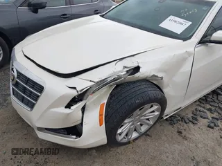 2014 Cadillac CTS Sedan RWD with VIN 1G6AP5SXXE0178113, listed as a IAAI auction lot 41982807 with 111,734 mi miles. Bid and sale history available at carsss.com. Image 6.