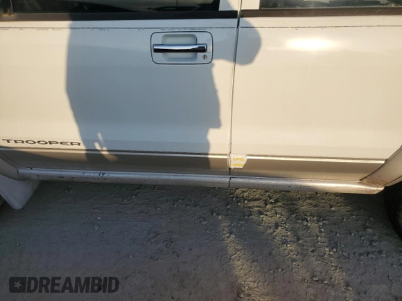 2000 Isuzu Trooper S z VIN JACDS58XXY7J11716, wystawiony jako Copart lot #76685304 z przebiegiem 92 828 mil mil oraz Nie do naprawy. Historia ofert i sprzedaży dostępna na DreamBid. Obrazek 13.