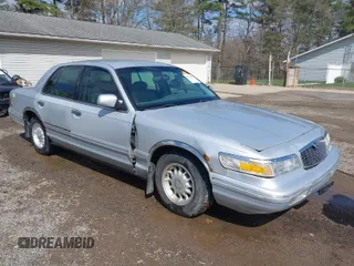 1997 Mercury Grand Marquis LS with VIN 2MELM75W3VX717801, listed as a IAAI auction lot 41920075 with 173,730 mi miles and . Bid and sale history available at DreamBid. Image 1.