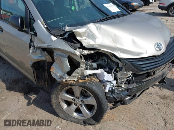 2015 Toyota Sienna L with VIN 5TDZK3DC4FS669496, listed as a IAAI auction lot 41691430 with 119,427 mi miles and . Bid and sale history available at DreamBid. Image 6.