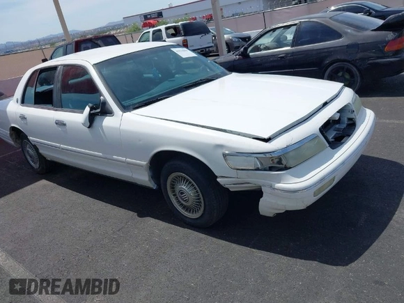 1996 Mercury Grand Marquis GS with VIN 2MELM74WXTX650841, listed as a IAAI auction lot 41936608 with 205,964 mi miles and . Bid and sale history available at DreamBid. Image 1.