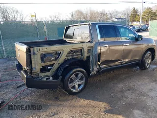 2022 Honda Ridgeline RTL-E with VIN 5FPYK3F79NB005152, listed as a IAAI auction lot 41754891 with 60,191 mi miles and . Bid and sale history available at DreamBid. Image 4.