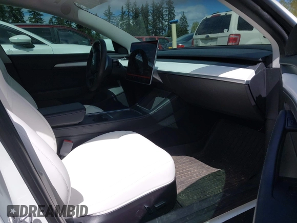 2021 Tesla Model 3 Performance with VIN 5YJ3E1EC2MF096681, listed as a IAAI auction lot 42068782 with 34,852 mi miles and . Bid and sale history available at DreamBid. Image 5.