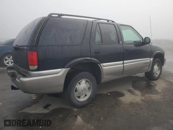 1998 GMC Jimmy SL with VIN 1GKCS13W8W2572514, listed as a Copart auction lot 83016224 with 85,044 mi miles and Salvage Title. Bid and sale history available at carsss.com. Image 3.