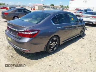 2017 Honda Accord Touring with VIN 1HGCR3F97HA041159, listed as a IAAI auction lot 42205195 with Not provided miles and . Bid and sale history available at DreamBid. Image 4.