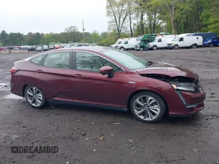 2018 Honda Clarity z VIN JHMZC5F12JC021958, wystawiony jako IAAI lot #42191071 z przebiegiem 29 423 mil mil oraz . Historia ofert i sprzedaży dostępna na DreamBid. Obrazek 13.