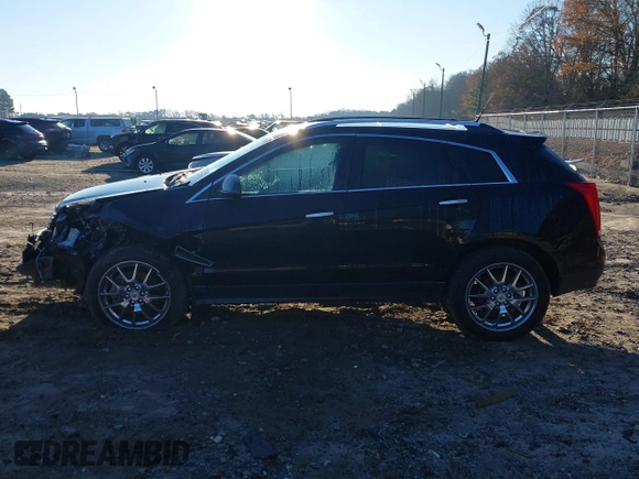 2013 Cadillac SRX Performance Collection with VIN 3GYFNHE31DS594457, listed as a IAAI auction lot 41145250 with 131,395 mi miles. Bid and sale history available at carsss.com. Image 14.