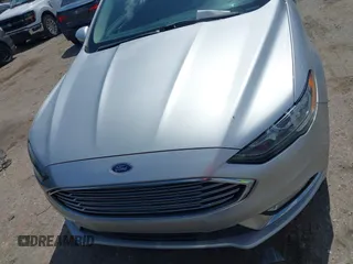 2017 Ford Fusion Hybrid SE with VIN 3FA6P0LU4HR234101, listed as a IAAI auction lot 42579447 with 169,273 mi miles and . Bid and sale history available at DreamBid. Image 12.