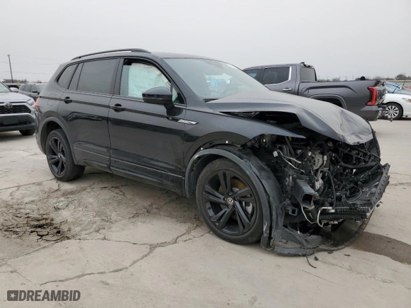 2023 Volkswagen Tiguan SE R-Line Black with VIN 3VVCB7AX0PM115167, listed as a Copart auction lot 48349595 with 36,962 mi miles and Salvage Title. Bid and sale history available at carsss.com. Image 4.