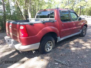 2001 Ford Explorer Sport Trac z VIN 1FMZU67EX1UA94698, wystawiony jako IAAI lot #42764474 z przebiegiem 299 653 mil mil oraz . Historia ofert i sprzedaży dostępna na DreamBid. Obrazek 4.