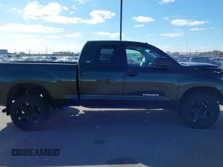 2011 Toyota Tundra 4WD Truck with VIN 5TFUM5F18BX020803, listed as a IAAI auction lot 41856078 with 110,119 mi miles. Bid and sale history available at carsss.com. Image 13.