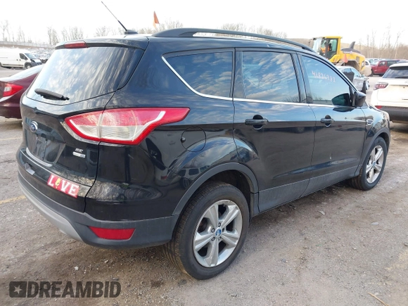 2013 Ford Escape SE with VIN 1FMCU9GXXDUC14903, listed as a IAAI auction lot 41826982 with 166,233 mi miles and . Bid and sale history available at DreamBid. Image 4.