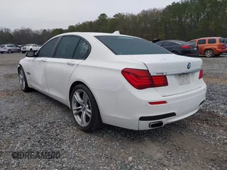 2014 BMW 7 Series 740i with VIN WBAYA6C51ED144387, listed as a IAAI auction lot 41226638 with 161,448 mi miles. Bid and sale history available at carsss.com. Image 3.