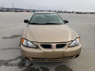 1999 Pontiac Grand Am SE2 with VIN 1G2NE52T2XM869508, listed as a Copart auction lot 44443755 with 119,769 mi miles and Salvage Title. Bid and sale history available at carsss.com. Image 5.