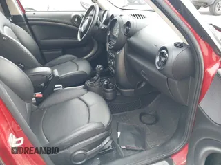 2013 MINI Countryman S with VIN WMWZC3C57DWP21892, listed as a IAAI auction lot 42402600 with 59,700 mi miles and . Bid and sale history available at DreamBid. Image 5.