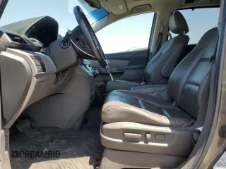 2012 Honda Odyssey Touring с VIN 5FNRL5H9XCB109229, выставлен на аукционе Copart как лот 59885895 с пробегом 153 668 миль миль и Чистый • Clean title. История ставок и продаж доступна на DreamBid. Изображение 7.
