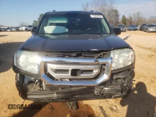 2010 Honda Pilot Touring with VIN 5FNYF4H80AB030671, listed as a Copart auction lot 41862355 with 198,388 mi miles and Salvage Title. Bid and sale history available at DreamBid. Image 5.