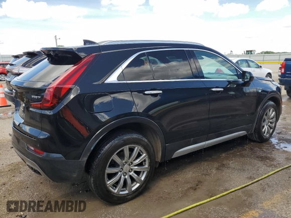 2020 Cadillac XT4 AWD Premium Luxury with VIN 1GYFZDR47LF088070, listed as a Copart auction lot 42802985 with 102,777 mi miles and Salvage title. Bid and sale history available at DreamBid. Image 3.