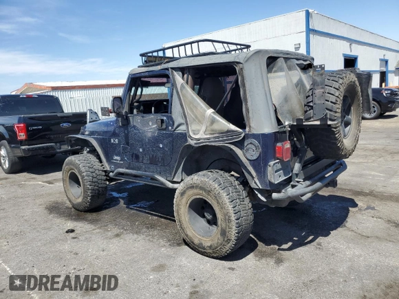 2004 Jeep Wrangler X with VIN 1J4FA39S64P721072, listed as a Copart auction lot 57512865 with Not provided miles and Clean title. Bid and sale history available at DreamBid. Image 2.