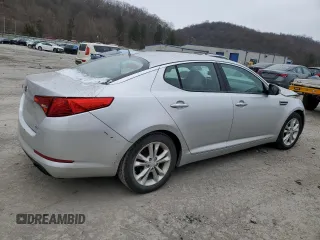 2013 Kia Optima EX z VIN 5XXGN4A7XDG144632, wystawiony jako Copart lot #83599614 z przebiegiem 97 316 mil mil oraz Szkoda całkowita • Salvage title. Historia ofert i sprzedaży dostępna na DreamBid. Obrazek 3.