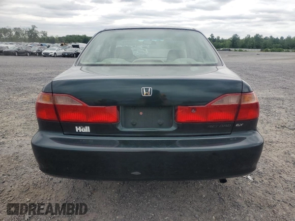 2000 Honda Accord EX z VIN 1HGCG6674YA001515, wystawiony jako Copart lot #56257935 z przebiegiem 215 030 mil mil oraz Czysty tytuł • Clean title. Historia ofert i sprzedaży dostępna na DreamBid. Obrazek 6.