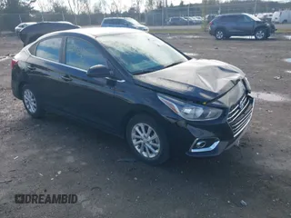 2022 Hyundai Accent SE with VIN 3KPC24A61NE170710, listed as a IAAI auction lot 40869215 with 28,459 mi miles. Bid and sale history available at carsss.com. Image 1.