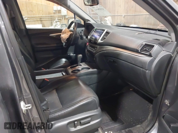 2016 Honda Pilot EX-L with VIN 5FNYF6H5XGB010230, listed as a IAAI auction lot 41858811 with 194,119 mi miles. Bid and sale history available at carsss.com. Image 5.