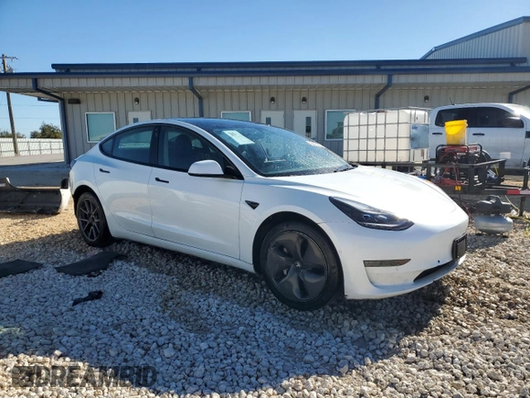 2021 Tesla Model 3 Standard Range Plus with VIN 5YJ3E1EA7MF089997, listed as a Copart auction lot 81528284 with 147,242 mi miles and Clean Title. Bid and sale history available at DreamBid. Image 4.