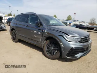 2022 Volkswagen Tiguan SE R-Line Black with VIN 3VV8B7AX2NM051233, listed as a Copart auction lot 54546455 with 61,848 mi miles and Salvage title. Bid and sale history available at DreamBid. Image 4.