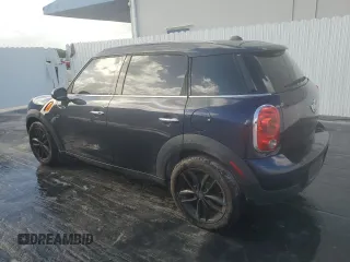 2013 MINI Countryman with VIN WMWZB3C59DWM08636, listed as a Copart auction lot 77442344 with 103,118 mi miles and Clean title. Bid and sale history available at DreamBid. Image 2.