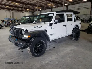 2023 Jeep Wrangler z VIN 1C4JJXN66PW599470, wystawiony jako Copart lot #57869385 z przebiegiem 31 379 mil mil oraz Szkoda całkowita • Salvage title. Historia ofert i sprzedaży dostępna na DreamBid. Obrazek 1.