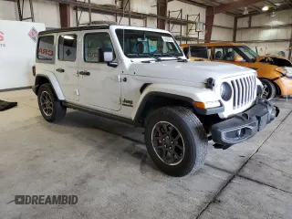 2021 Jeep Wrangler Unlimited 80th Anniversary z VIN 1C4HJXDG4MW636892, wystawiony jako Copart lot #63508455 z przebiegiem 29 208 mil mil oraz Szkoda całkowita • Salvage title. Historia ofert i sprzedaży dostępna na DreamBid. Obrazek 4.