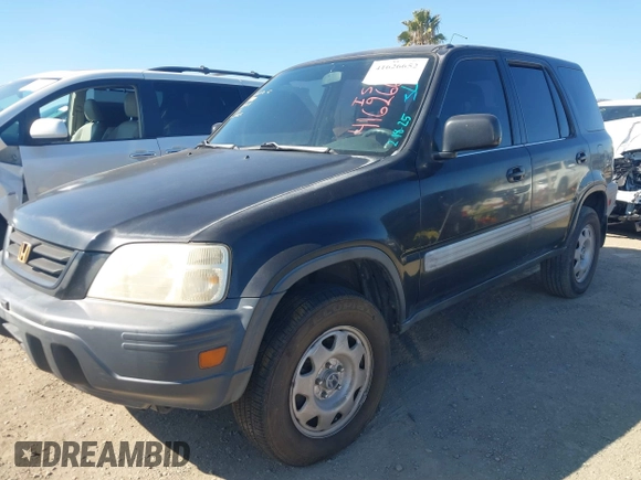 1999 Honda CR-V LX with VIN JHLRD2842XC009440, listed as a IAAI auction lot 41626652 with 158,905 mi miles. Bid and sale history available at carsss.com. Image 2.