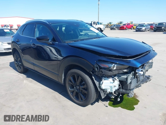 2021 Mazda CX-30 Premium with VIN 3MVDMBDYXMM307047, listed as a IAAI auction lot 41974966 with 53,409 mi miles and . Bid and sale history available at carsss.com. Image 1.
