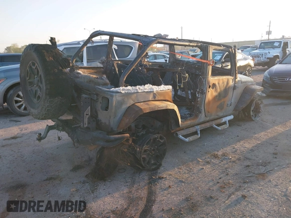 2014 Jeep Wrangler Unlimited Rubicon with VIN 1C4HJWFG8EL159345, listed as a IAAI auction lot 41846272 with Not provided miles and . Bid and sale history available at DreamBid. Image 4.