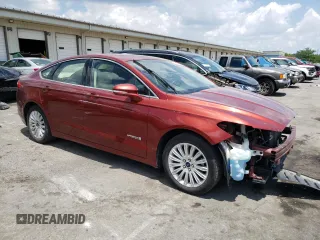 2014 Ford Fusion SE Hybrid with VIN 3FA6P0LU3ER253735, listed as a Copart auction lot 63222635 with 147,470 mi miles and Salvage title. Bid and sale history available at DreamBid. Image 4.