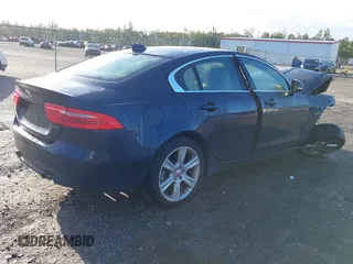 2017 Jaguar XE 25t Prestige with VIN SAJAE4BG2HA953713, listed as a IAAI auction lot 41657172 with 93,083 mi miles. Bid and sale history available at carsss.com. Image 4.