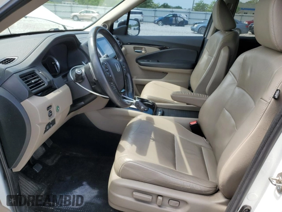 2016 Honda Pilot Touring with VIN 5FNYF6H92GB057531, listed as a Copart auction lot 54354145 with 86,806 mi miles and Salvage Title. Bid and sale history available at DreamBid. Image 7.