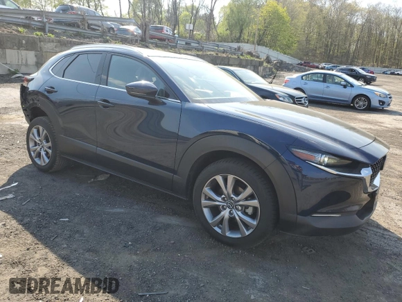 2022 Mazda CX-30 S Premium with VIN 3MVDMBDL3NM404404, listed as a Copart auction lot 54438705 with 41,311 mi miles and Salvage title. Bid and sale history available at DreamBid. Image 4.