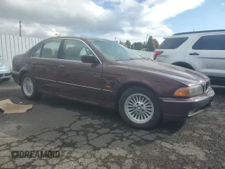 1997 BMW 5 Series 540iA with VIN WBADE6320VBW54072, listed as a Copart auction lot 74403104 with 98,910 mi miles and Clean Title. Bid and sale history available at carsss.com. Image 4.