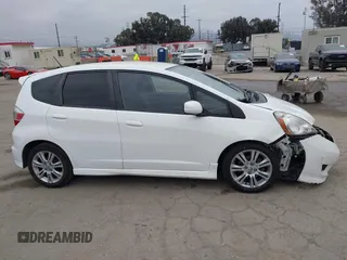 2009 Honda Fit Sport with VIN JHMGE88409S021730, listed as a IAAI auction lot 42045023 with 309,995 mi miles. Bid and sale history available at carsss.com. Image 13.