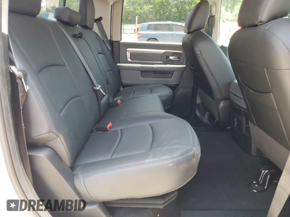 2018 Ram 1500 Big Horn z VIN 1C6RR7LT7JS254698, wystawiony jako Copart lot #57526965 z przebiegiem 46 700 mil mil oraz Szkoda całkowita • Salvage title. Historia ofert i sprzedaży dostępna na DreamBid. Obrazek 10.