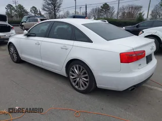 2013 Audi A6 Premium Plus with VIN WAUGFAFC6DN051237, listed as a IAAI auction lot 41553452 with 114,446 mi miles and . Bid and sale history available at DreamBid. Image 3.
