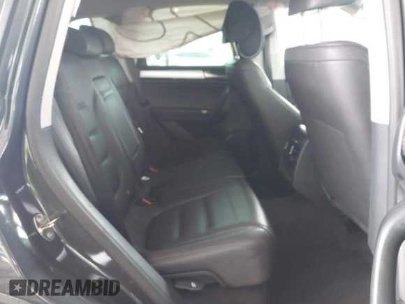 2014 Volkswagen Touareg Sport with VIN WVGEF9BP0ED015273, listed as a IAAI auction lot 42046823 with 84,694 mi miles and . Bid and sale history available at DreamBid. Image 8.