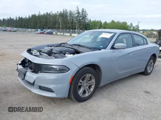 2022 Dodge Charger SXT with VIN 2C3CDXBG4NH201640, listed as a IAAI auction lot 42161657 with 48,690 mi miles and . Bid and sale history available at DreamBid. Image 2.