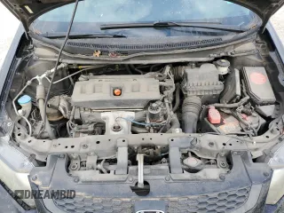 2012 Honda Civic Cpe LX with VIN 2HGFG3B54CH553218, listed as a Copart auction lot 52603785 with 121,672 mi miles and Clean Title. Bid and sale history available at carsss.com. Image 11.